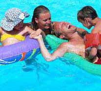 Family in Clean Swimming Pool